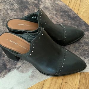 Report Studded black mule